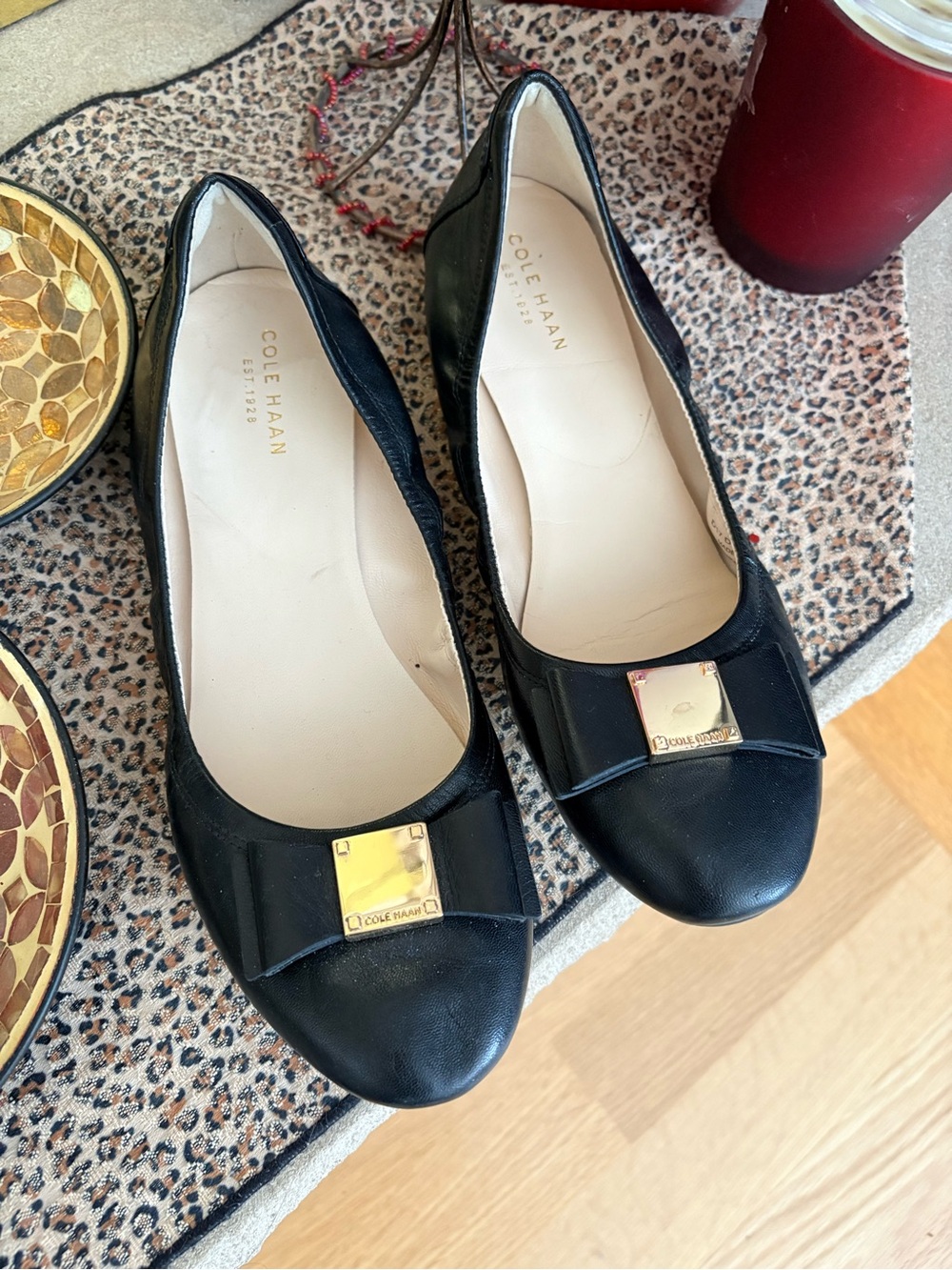 Cole Haan Black Leather Ballet Flats with Gold Plaque
